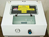 Top of Systems Chemistry enclosure with lid open showing chemical warning labels, pressure gauge, and Veriflo regulator knob