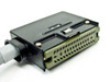 Rear view of JAE DD-C1-J17 metal-shell rectangular connector showing pin field and latching mechanism detail
