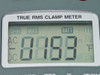 Right-Tech 53341 clamp meter LCD close-up showing D-H, MAX, BATT indicators and AC/DC/°F/MkΩHz annunciators