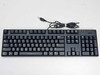 Dell KB1421 USB wired full-size keyboard — top view showing 104-key layout and USB cable
