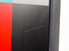 Dell 2001FP lower-left bezel close-up — visible surface scratches and scuffs on black plastic bezel