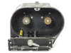 Mitchell 520/3A/300 interior open – two toothed sprocket drive gears, film guide roller, yellow component visible in lower channel, and locking bolt at base