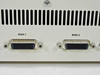 Rear panel close-up of MR-1010 showing WAN 1 and WAN 2 DB26 serial ports