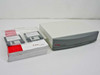 Cray Communications MR-1010 MatchBox Router desktop unit shown with included Case Technology configuration floppy disks in box