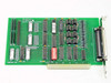 Dison Technology AMC167 Rev A 8-bit ISA port controller card — component side showing 40-pin internal header, DIP ICs, red DIP switch bank, and 37-pin D-sub external connector with ISA edge connector