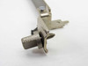 Burndy 9150 card bracket right-end detail showing latch mechanism with minor surface oxidation
