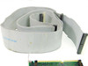 Cubix A2430 expansion chassis interface card with Spectra-Strip 60-pin ribbon cable laid out — top view