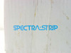Spectra-Strip brand logo printed on the flat ribbon cable body — closeup detail