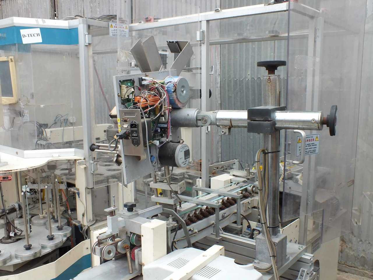 Gima CD840 DISK PACKER MACHINE WITH LABELER. CD-840