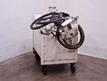 Parker Hannifin hydraulic power unit on caster wheels — left rear three-quarter view showing hydraulic hoses and accumulator cylinder