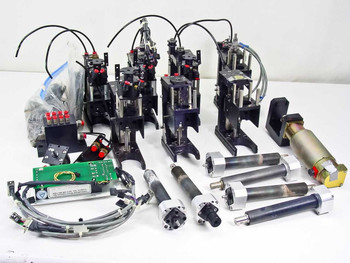 Full lot overview — SMC NCRB1BW20-90S rotary actuator assemblies, RSR 12WVM linear slides, Pittman motor, PCB and wiring harness spread on white background