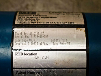 MTS Level Plus A910750172 label showing model number, serial number, date code 09/93, length 75in, gradient, and temp code T4