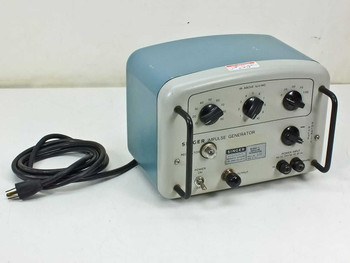 Singer 91263-1 Impulse Field Generator – three-quarter front-left view showing blue and gray benchtop enclosure with front panel controls and AC power cord