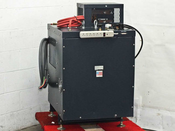 Hitran AT0098-01 welding transformer — left/rear quarter view showing ventilated top enclosure, control panel, and cable routing