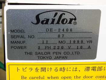 Sailor OE-2406 arm — side view showing suction cup gripper and solenoid valve manifold