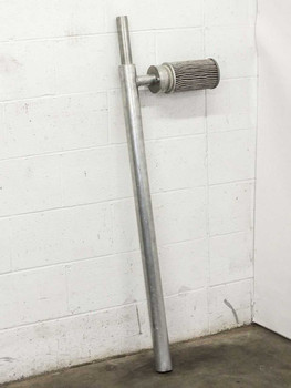 Industrial pleated air filter element on 51-inch adjustable aluminum pole, leaning against wall – full assembly view