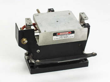 Steag Firstlight heating element with lifting bar stand — front-right view showing danger label rated 300°C and black anodized base