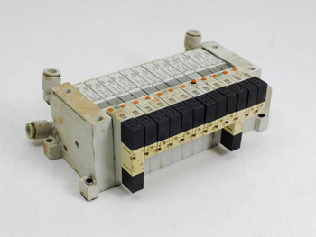 SMC VQ1201N-5 VQ1101N-5 solenoid valve manifold – rear three-quarter view showing solenoid coil blocks
