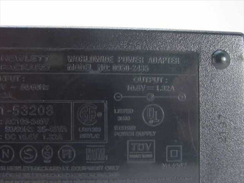 HP 0950-2435 Worldwide Power Adapter – bottom label showing model number, 10.6VDC 1.32A output, UL and TUV certifications