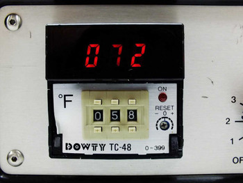 Dowty TC-48 close-up of LED display showing 072°F and thumbwheel setpoint set to 058, ON and RESET buttons visible