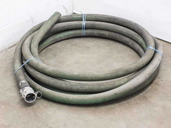 2-inch x 50 ft flexible transfer hose coiled on floor with aluminum cam lock coupling visible at one end