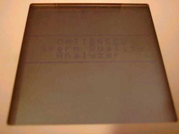 Optibreed SQA III LCD screen showing 'Sperm Quality Analyzer' startup text