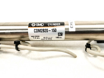 SMC CDM2B20-150 cylinder label showing model number, max pressure 1.0 MPa, 10.2 kgf/cm², 145 PSI, Made in Japan