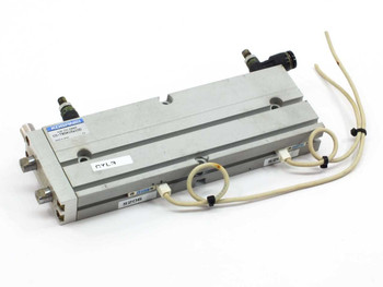 Koganei CS-TBDA16x100 pneumatic double air cylinder – top/front view showing body, push-in fittings, and sensor wiring leads