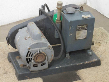 Welch 1399 DuoSeal Belt Drive Vacuum Pump with Dayton capacitor-start motor mounted on base plate — left side view