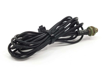 Omron E32-D11 optical fiber sensor cable coiled, full length view showing black lead and threaded tip