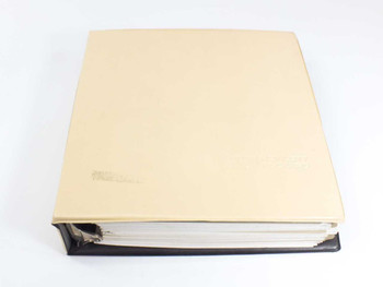 HP E1326B E1411B User's Manual — full binder closed, cream cover with black spine