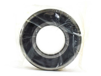 Fafnir 311NPP deep groove ball bearing removed from box, showing full face of bearing in sealed clear plastic wrap against white background