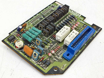 Epson G490202000 HCN PCB-147F Interface Card — reverse angle top view showing MDRI marking, teal capacitors, relay block, and blue IDC connector