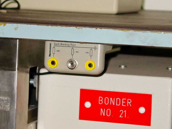 Vermaison Earth Bonding Point panel with yellow banana jacks and 1MΩ resistors mounted under table; Bonder No. 21 red label visible