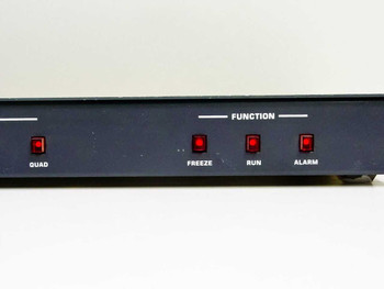 American Dynamics AD1473 QuadView II — close-up of FUNCTION section showing QUAD, FREEZE, RUN, and ALARM illuminated pushbuttons