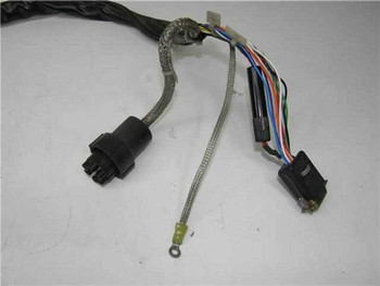 Varian VZC-6965 signal harness assembly showing braided shielding, multi-pin connectors, ground lug, and multi-conductor wiring