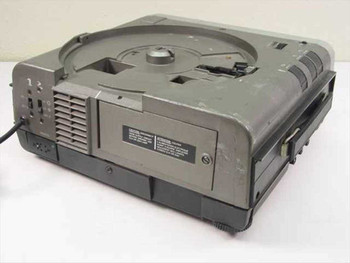 Telex Caramate 3200 projector side view showing lens assembly and focus controls