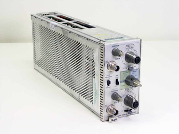Tektronix 7A26 Dual Trace Amplifier Plug-In – angled front and side view showing front panel controls and vented housing