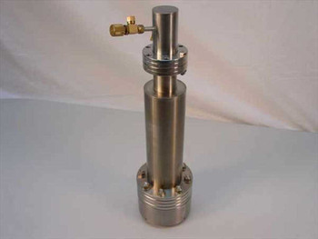 Vacuum Generators Ltd RGA residual gas analyzer head — full unit standing upright, stainless steel cylindrical body with brass gas inlet valve at top and UHV flange base
