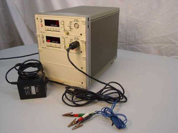 HP 78901A Patient Bedside Monitor front-right view with 78203C and 78302C modules, 3-lead wire and AC adapter visible on bench