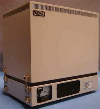 Octel Aspen Branch XP Voice Processing System – front-right three-quarter view showing beige tower enclosure with Co-Tel badge and component label on lower right