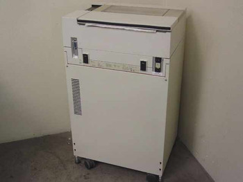 HP C2354A 2300 Line Printer – front right angle view showing paper feed slot, operator panel area, and cabinet on casters