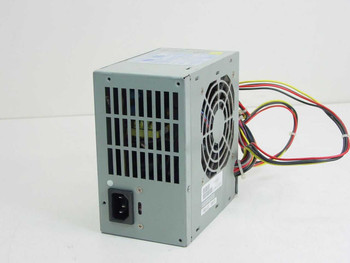 Packard Bell 190312 Lite-On PS-5101-2B 90W ATX power supply — rear view showing IEC AC inlet, fan exhaust grille, and voltage select switch