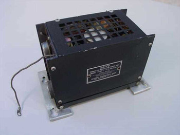 NARCO T-12MP-7 Transistor Modulator-Power Unit — right-side three-quarter view showing black metal chassis, ventilation grid top, and mounting feet