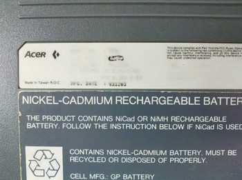 Acer 750C bottom label showing MFG date 931203 and NiCad rechargeable battery warning