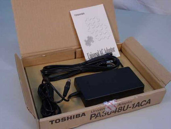 Toshiba PA3048U-1ACA Universal AC Adapter in open retail box with power cable and user guide booklet