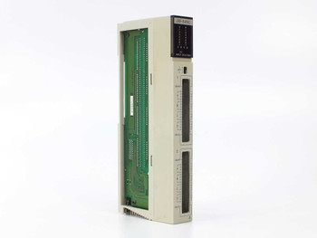 Sharp JW-64NC DC Input Module – left-side view showing backplane connector pins and module housing