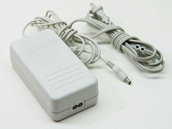 HP C4557-60004 AC Power Adapter — full unit with AC power cord and DC barrel output cable, top-right view