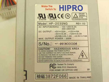 Hipro HP-203SNG label closeup – model number, Rev 02, AC input and DC output specifications, serial number, FCC markings