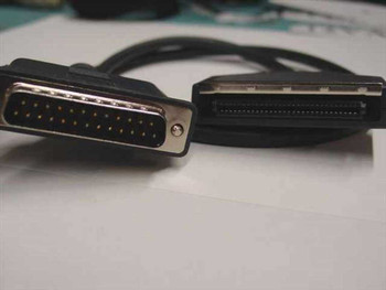 Dell 45647 floppy cable close-up of DB25 male 25-pin connector (left) and 50-pin SCSI-2 style floppy drive connector (right)